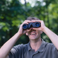 man with binoculars